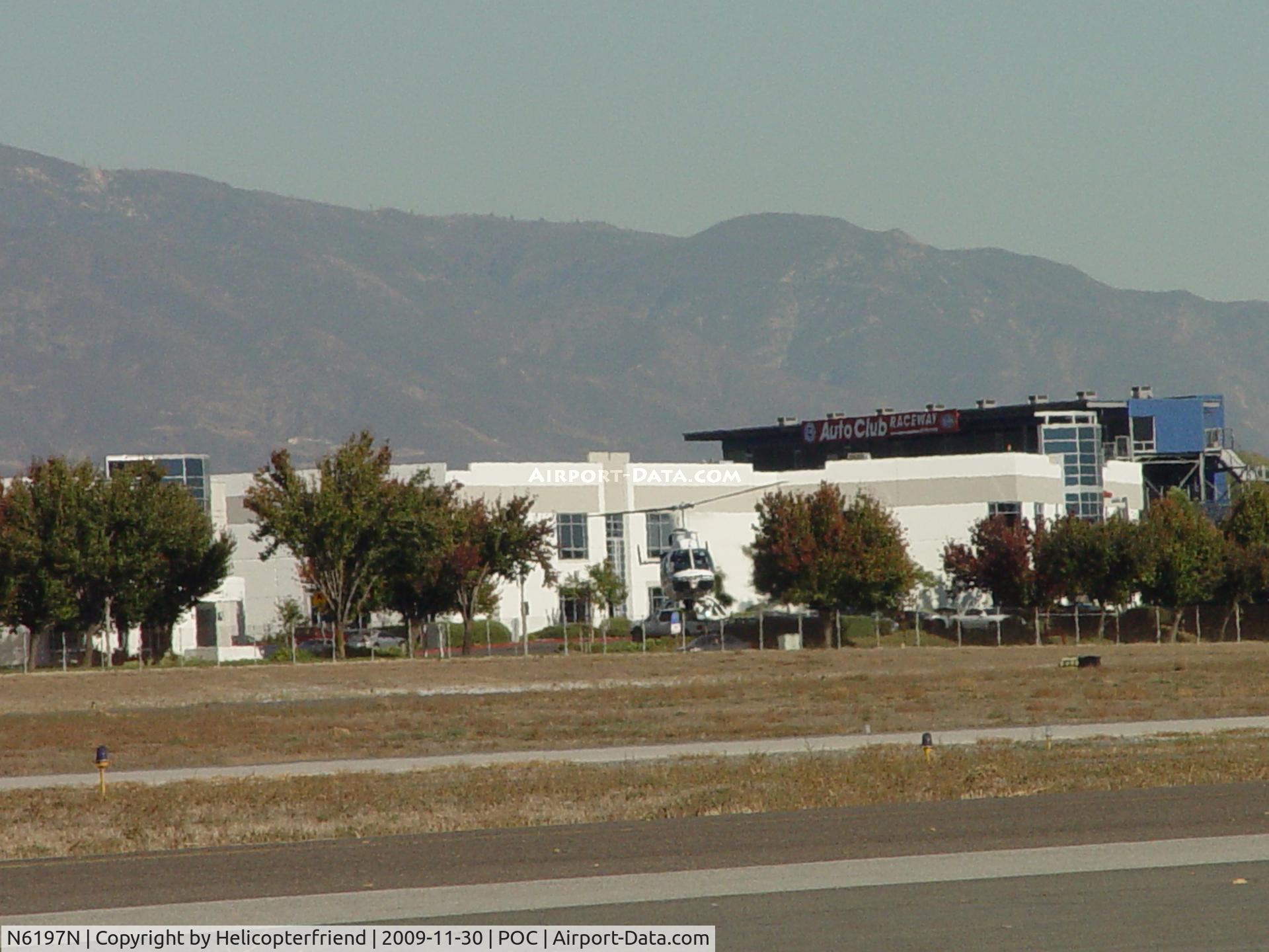 N6197N, 1993 Bell 206L-4 LongRanger IV LongRanger C/N 52014, Almost down on 26R, still turned into the wind