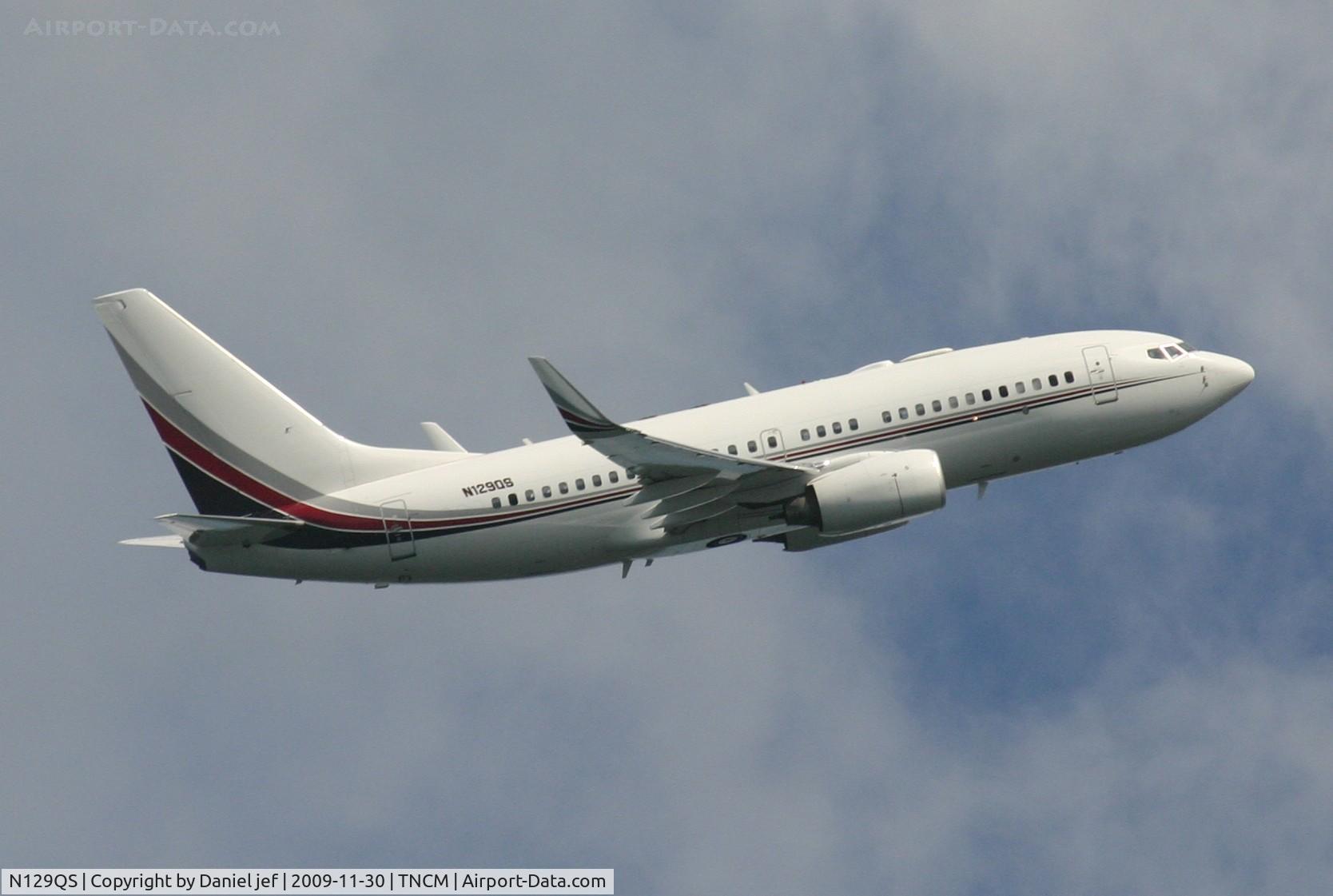 N129QS, 1999 Boeing 737-7BC C/N 30329, The N129QS departing St Maarten and clearing the hills back to the us!!!