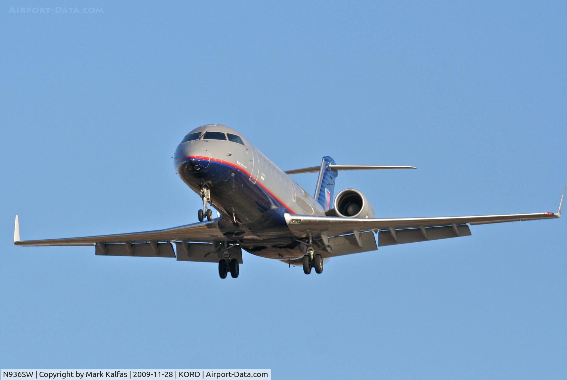 N936SW, 2002 Bombardier CRJ-200LR (CL-600-2B19) C/N 7726, SkyWest CL-600-2B19, SKW6004 short final 27L, from KMSN.
