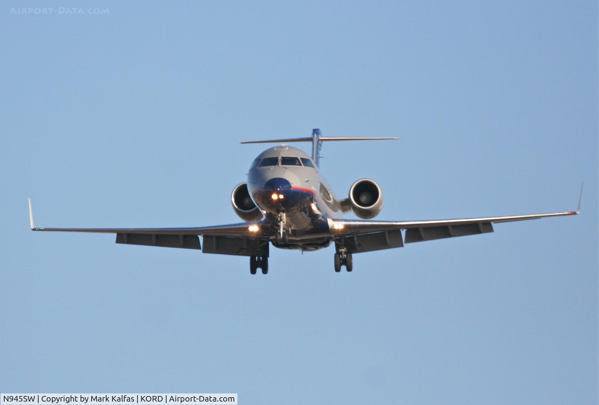 N945SW, 2003 Bombardier CRJ-200LR (CL-600-2B19) C/N 7770, SkyWest CL-600-2B19, SKW6270 short final 27L, from KFSD.
