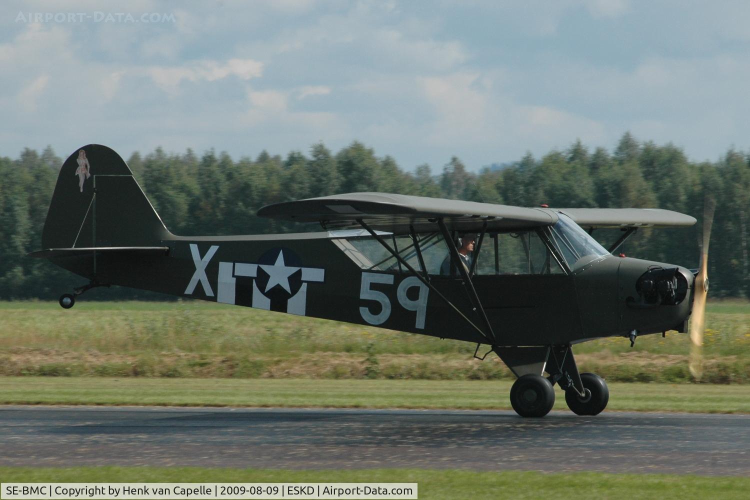 SE-BMC, 1944 Piper L-4J Grasshopper (J3C-65D) C/N 12847, Mikael Carson demonstrates his Piper Cub at Dala-Järna airfield, Sweden.