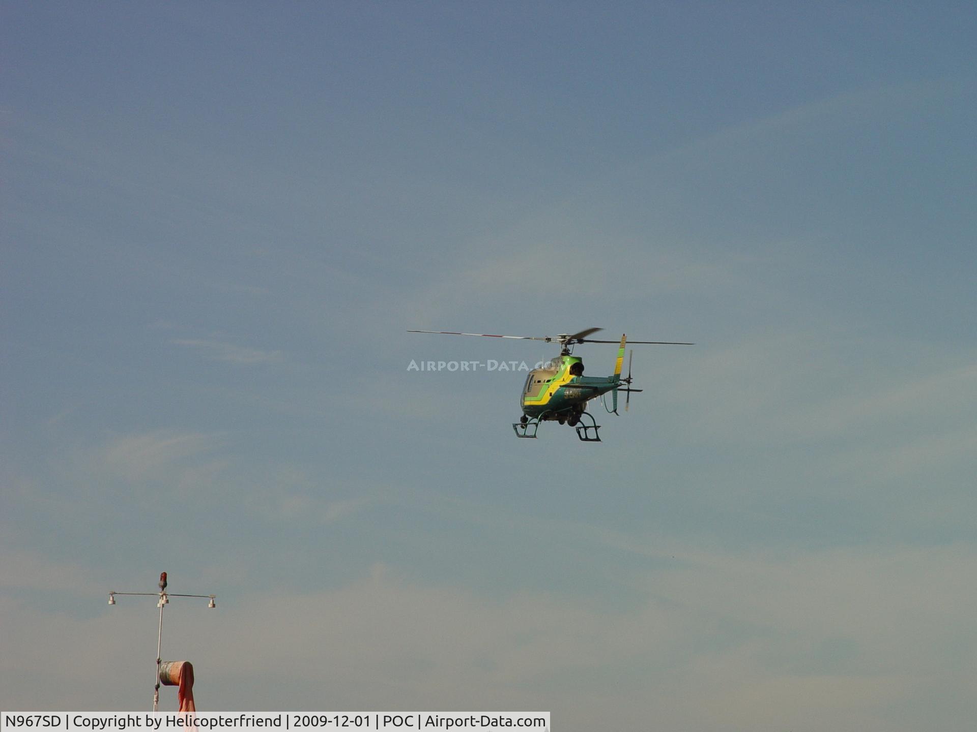 N967SD, 2003 Eurocopter AS-350B-2 Ecureuil C/N 3678, Flaring out for landing at helipad