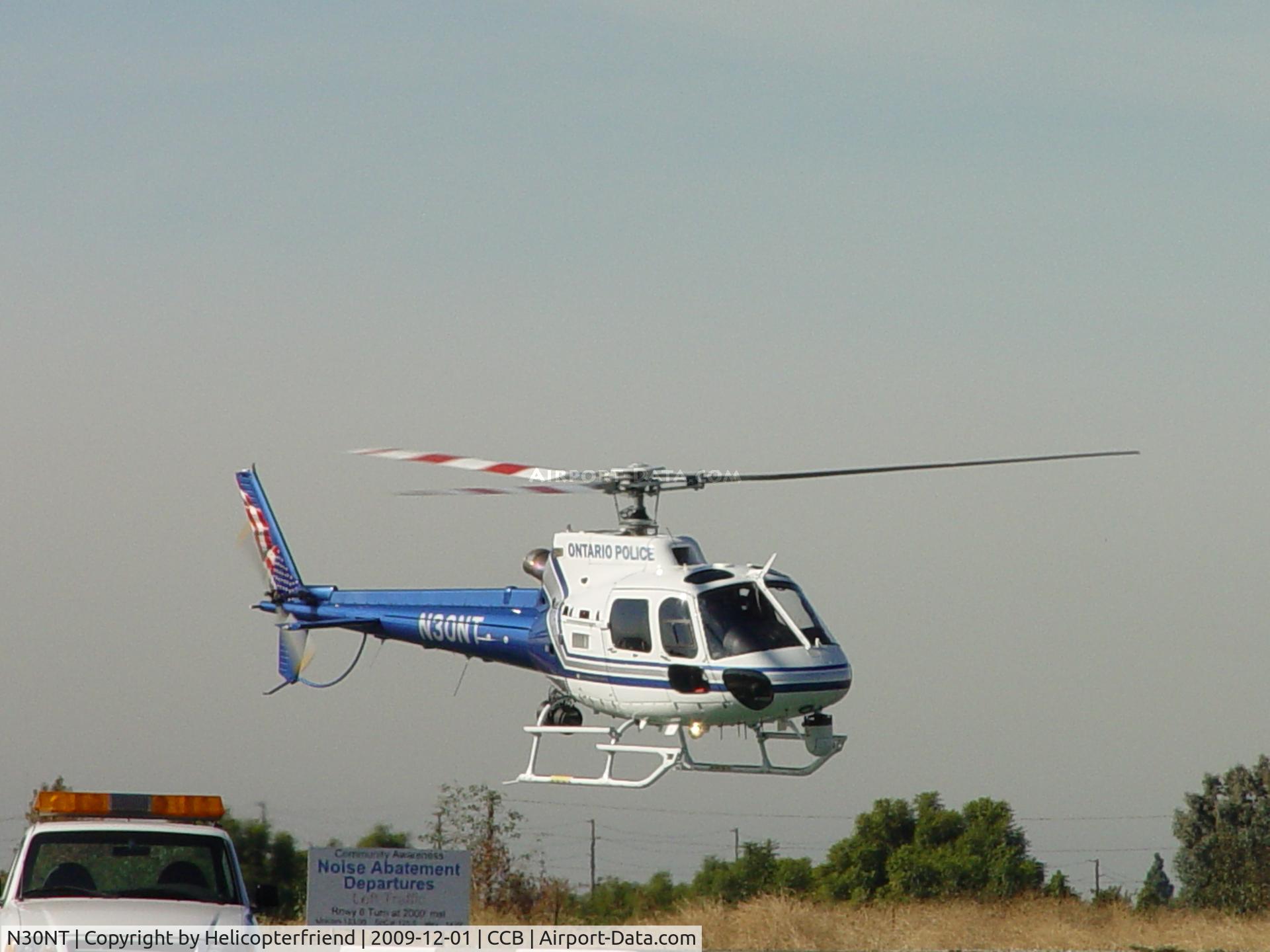 N30NT, 2007 Eurocopter AS-350B-2 Ecureuil C/N 4352, Hovering, checking for traffic before turning west for take off and patrol