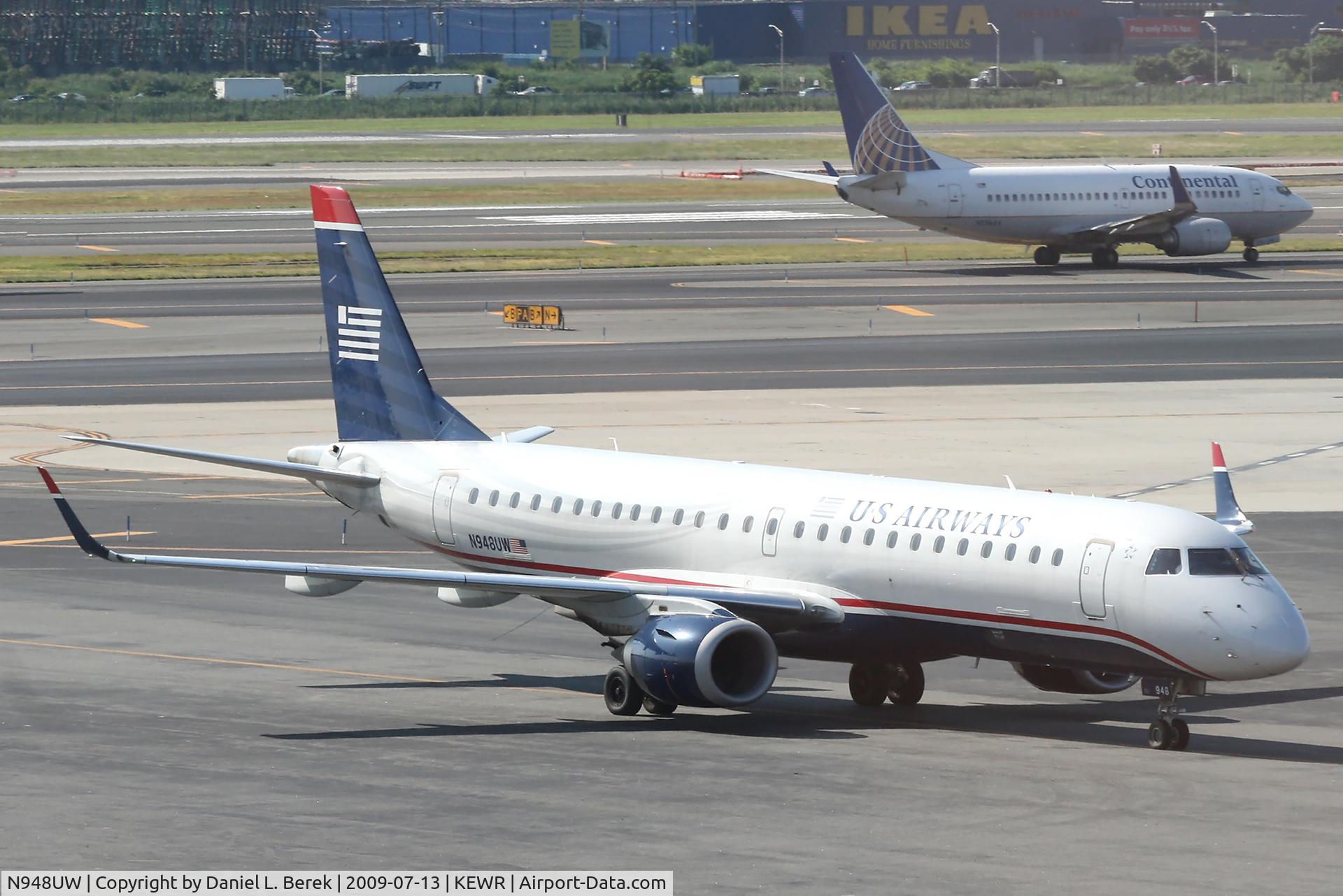 N948UW, 2007 Embraer 190AR (ERJ-190-100IGW) C/N 19000081, A brand-new US Airways regional jet taxies in at Newark.