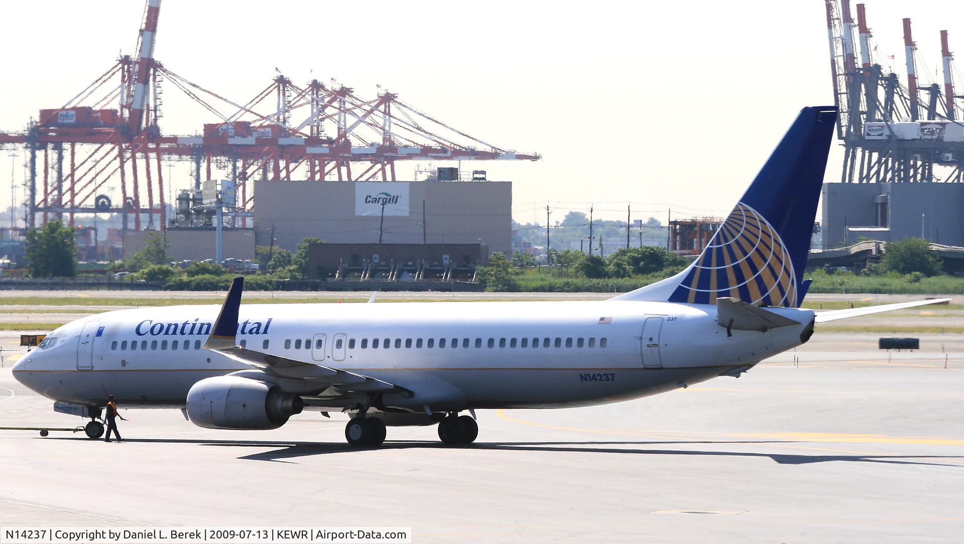N14237, 1999 Boeing 737-824 C/N 28802, One of Continental's ETOPS 738s is pushed back for another flight to a sunny destination.