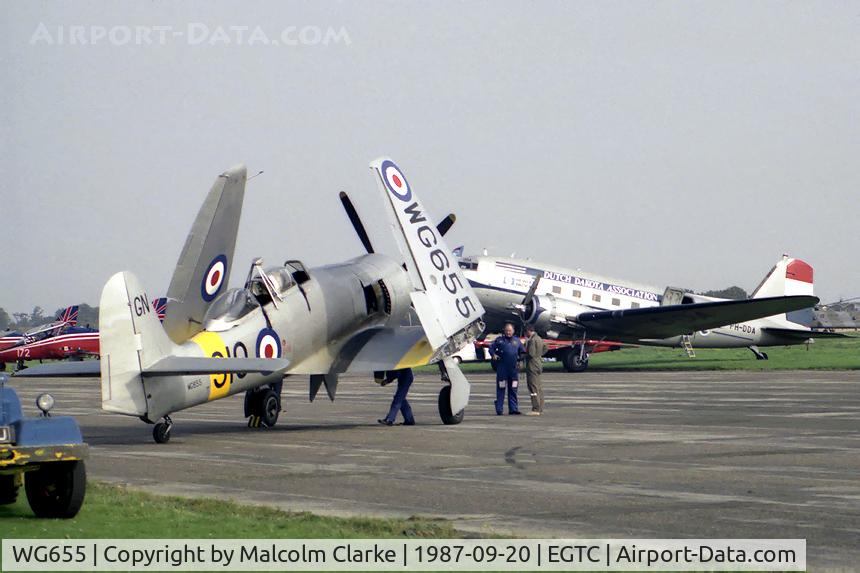 WG655, 1952 Hawker Sea Fury T.20 C/N 41H/636070, Hawker Sea Fury T20S at Cranfield's International Air Fair 1987. Behind is C-47A PH-DDA from the Dutch Dakota Association.