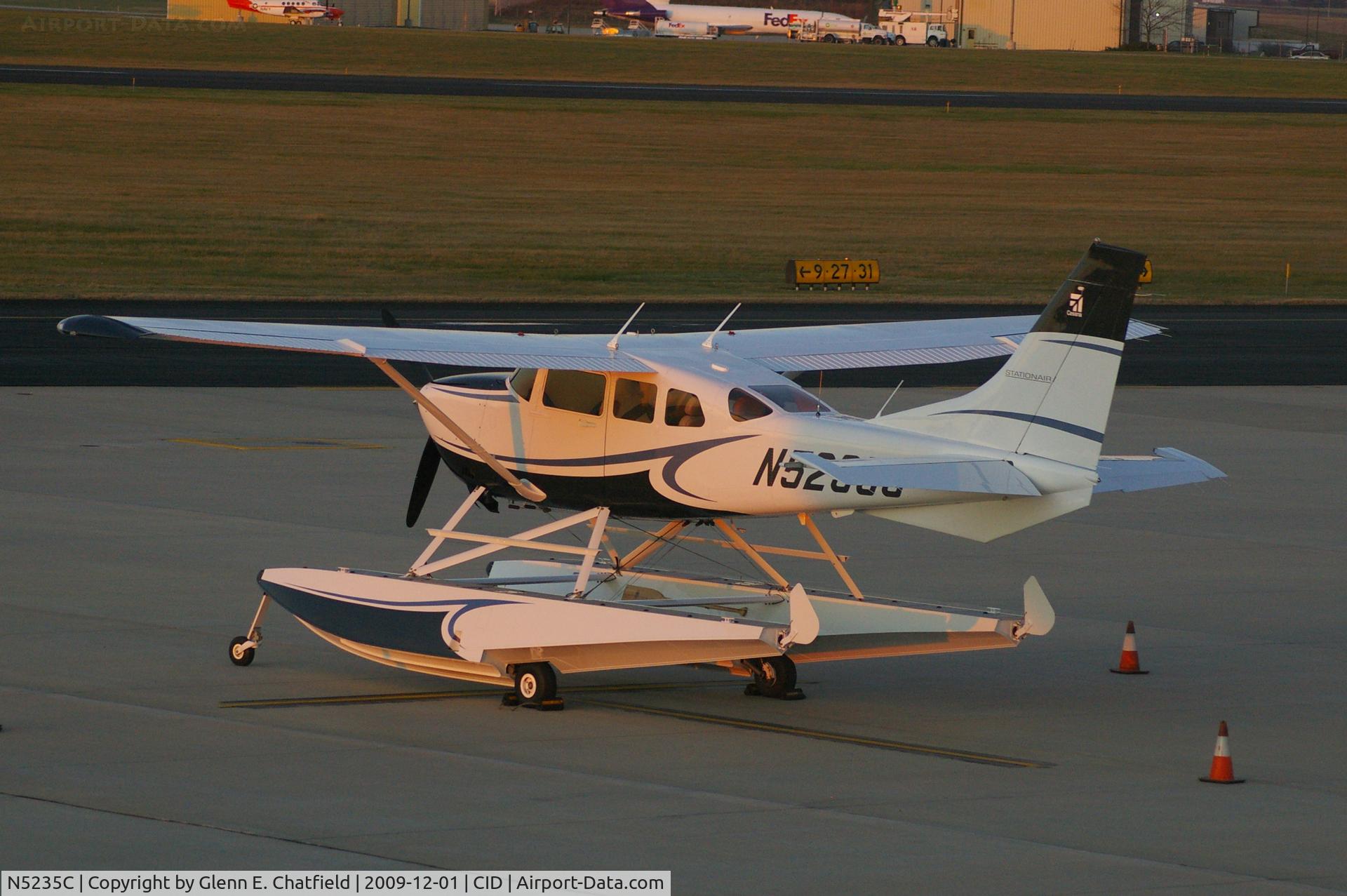 N5235C, 2009 Cessna 206H Stationair C/N 20608319, Early morning, parked on Landmark ramp