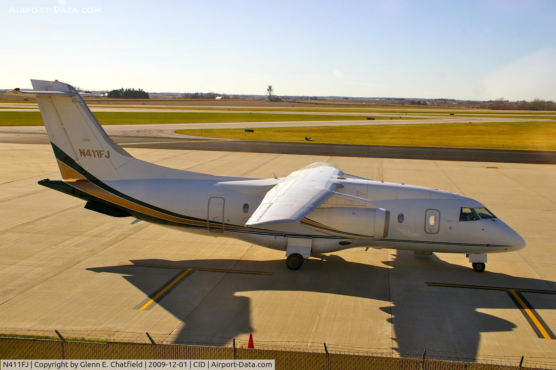 N411FJ, 2000 Fairchild Dornier 328-300 328JET C/N 3166, In front of my office window.  Preparing for departure.