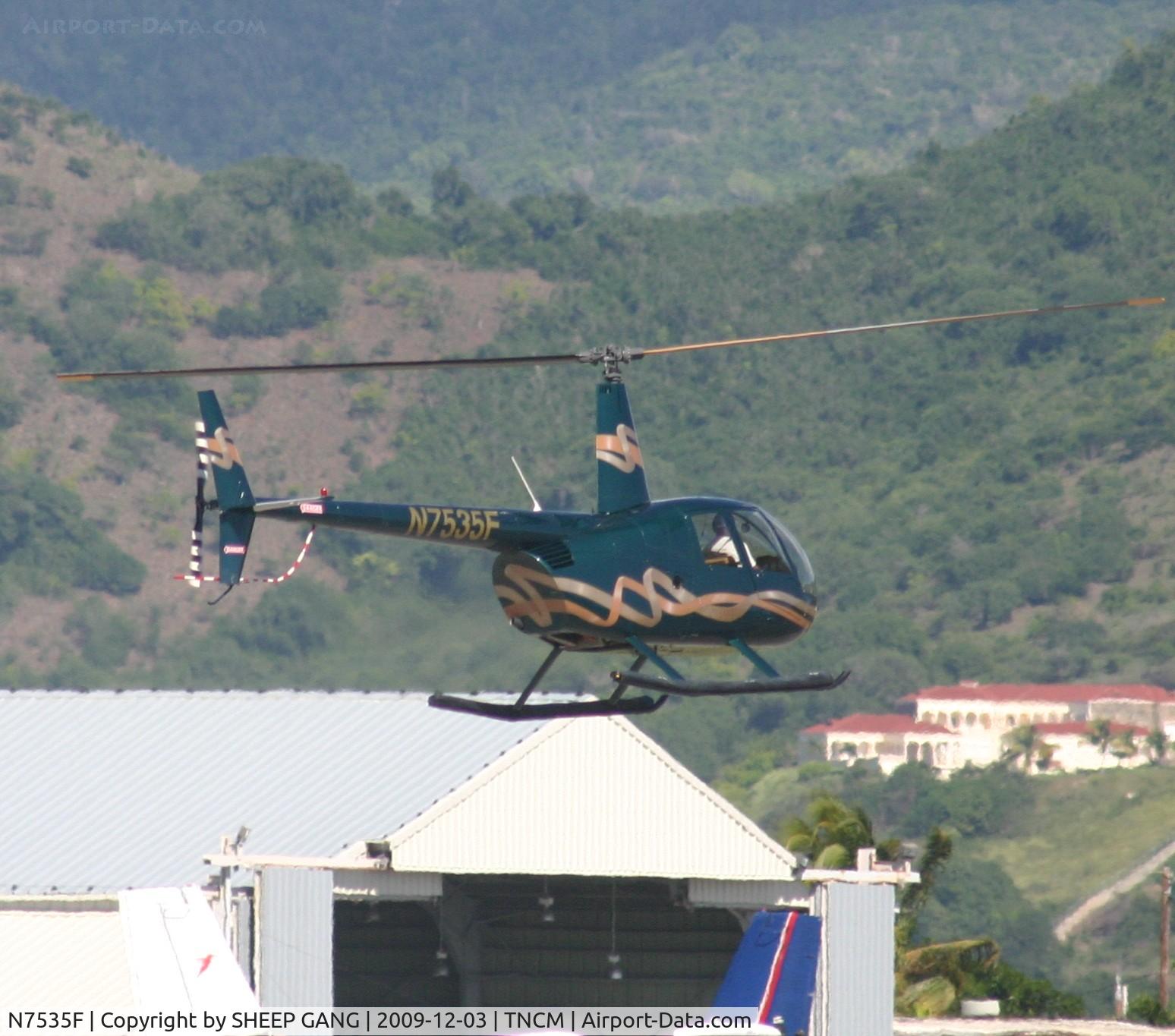 N7535F, 2004 Robinson R44 II C/N 10459, N7535F Just after lift off on its way to the eastern ramp for parking
