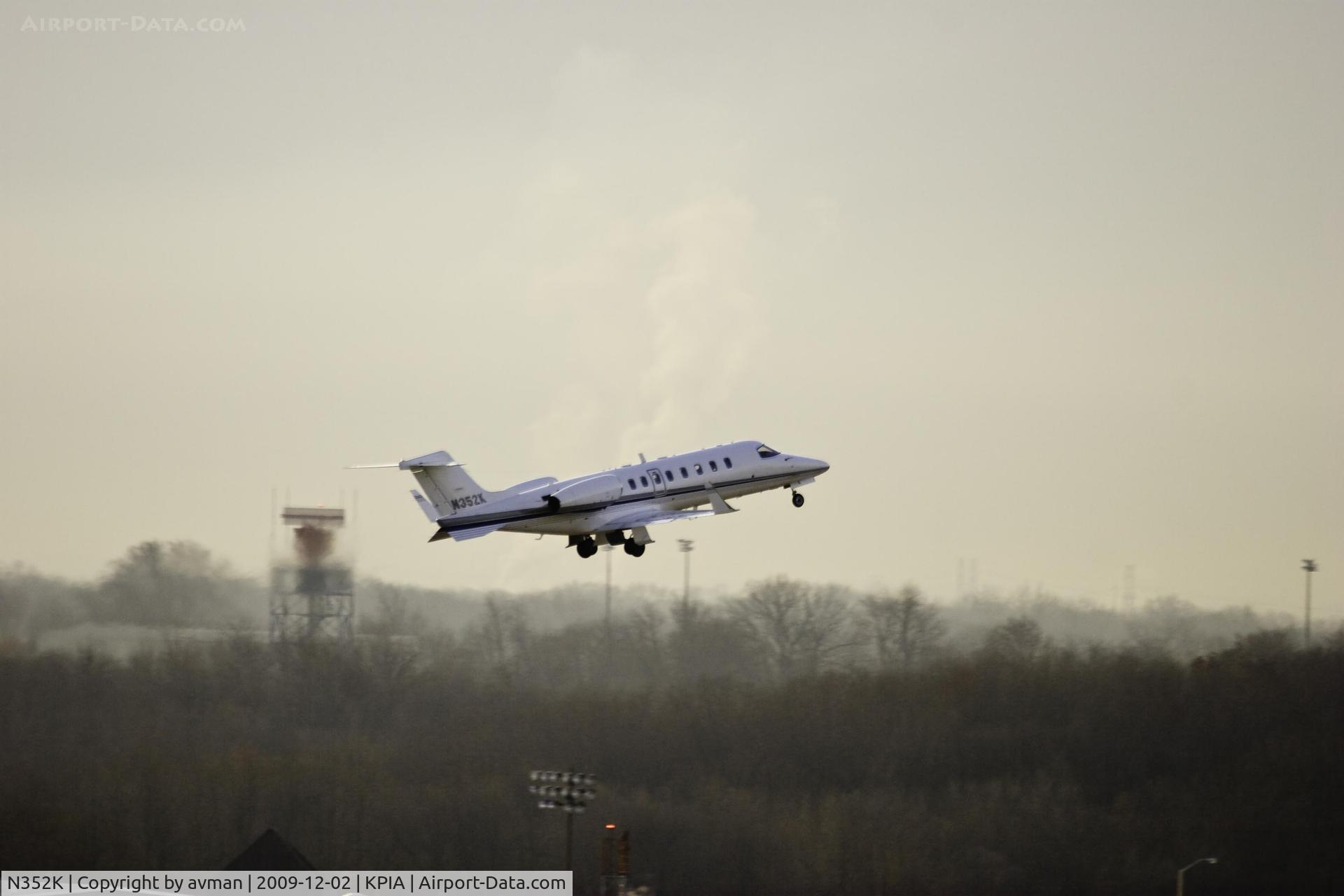 N352K, Learjet Inc 45 C/N 215, N352K airborne from Peoria Illinois