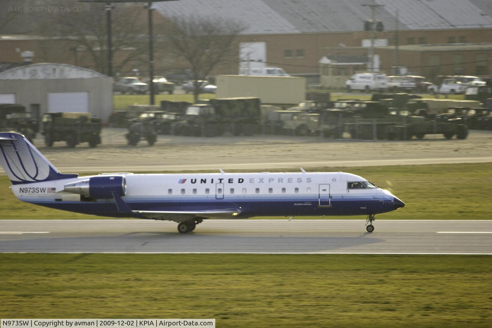 N973SW, 2004 Bombardier CRJ-200ER (CL-600-2B19) C/N 7949, United Express (N973SW) departing Peoria Illinois