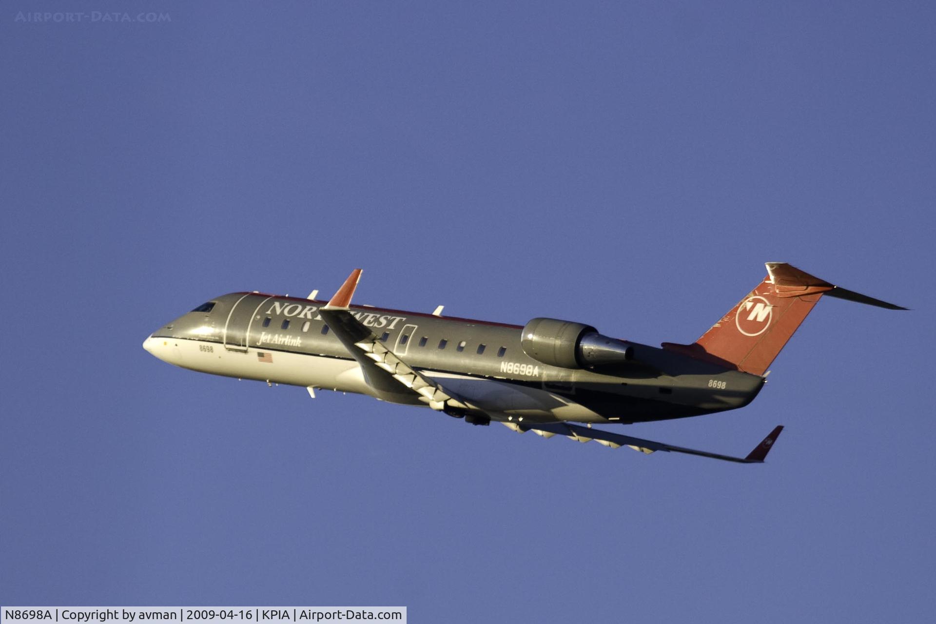 N8698A, 2002 Bombardier CRJ-200 (CL-600-2B19) C/N 7698, Northwest Airlink (N8698A) climbs out from Peoria Illinois