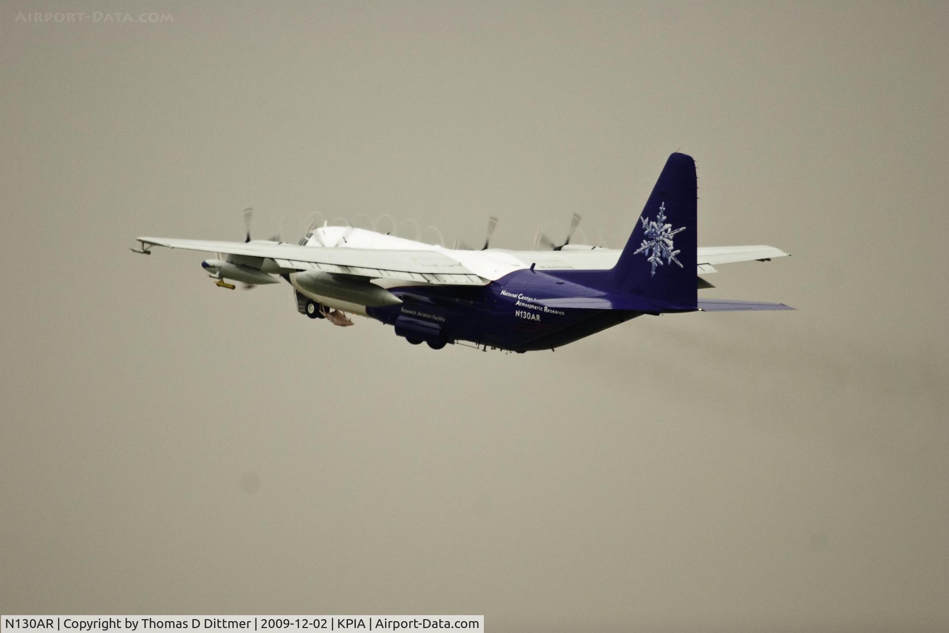 N130AR, 1984 Lockheed EC-130Q Hercules C/N 382-4984, N130AR departs Peoria Illinois on a weather related mission