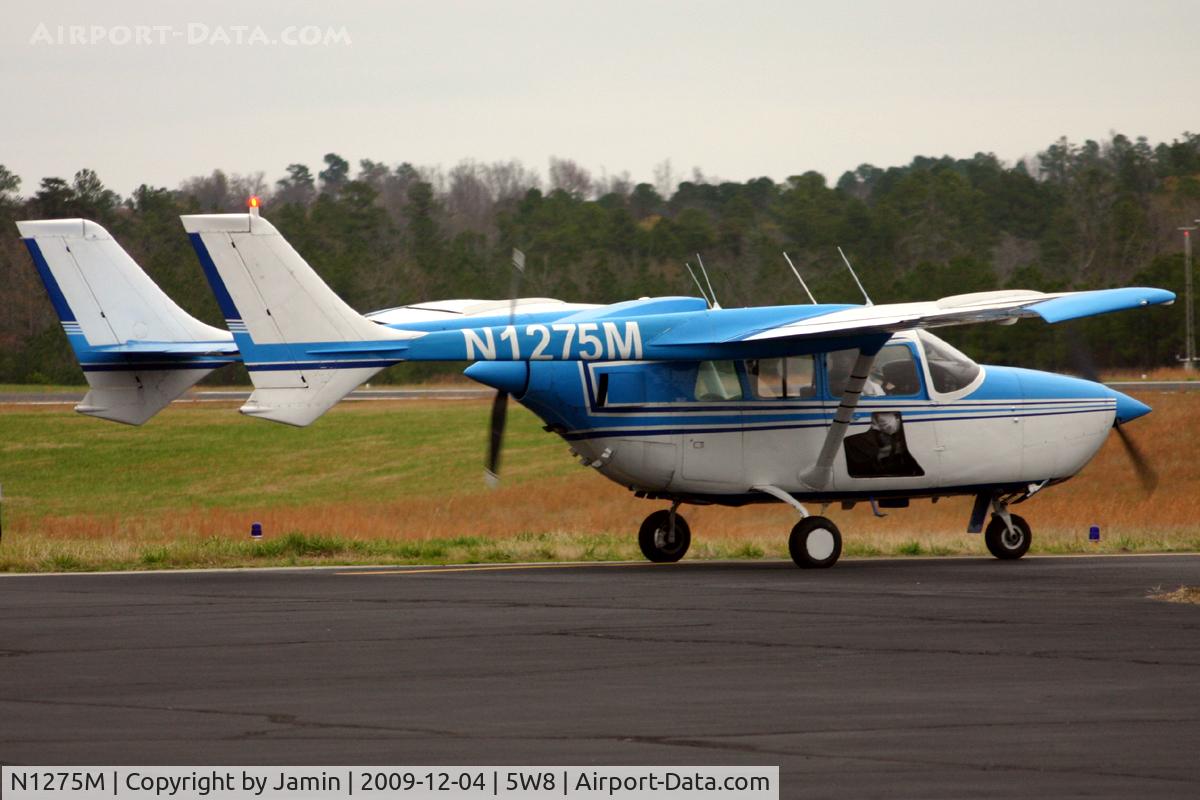 N1275M, 1970 Cessna 337E Super Skymaster C/N 33701275, Taxiing to the runway on a dreary winter afternoon.
