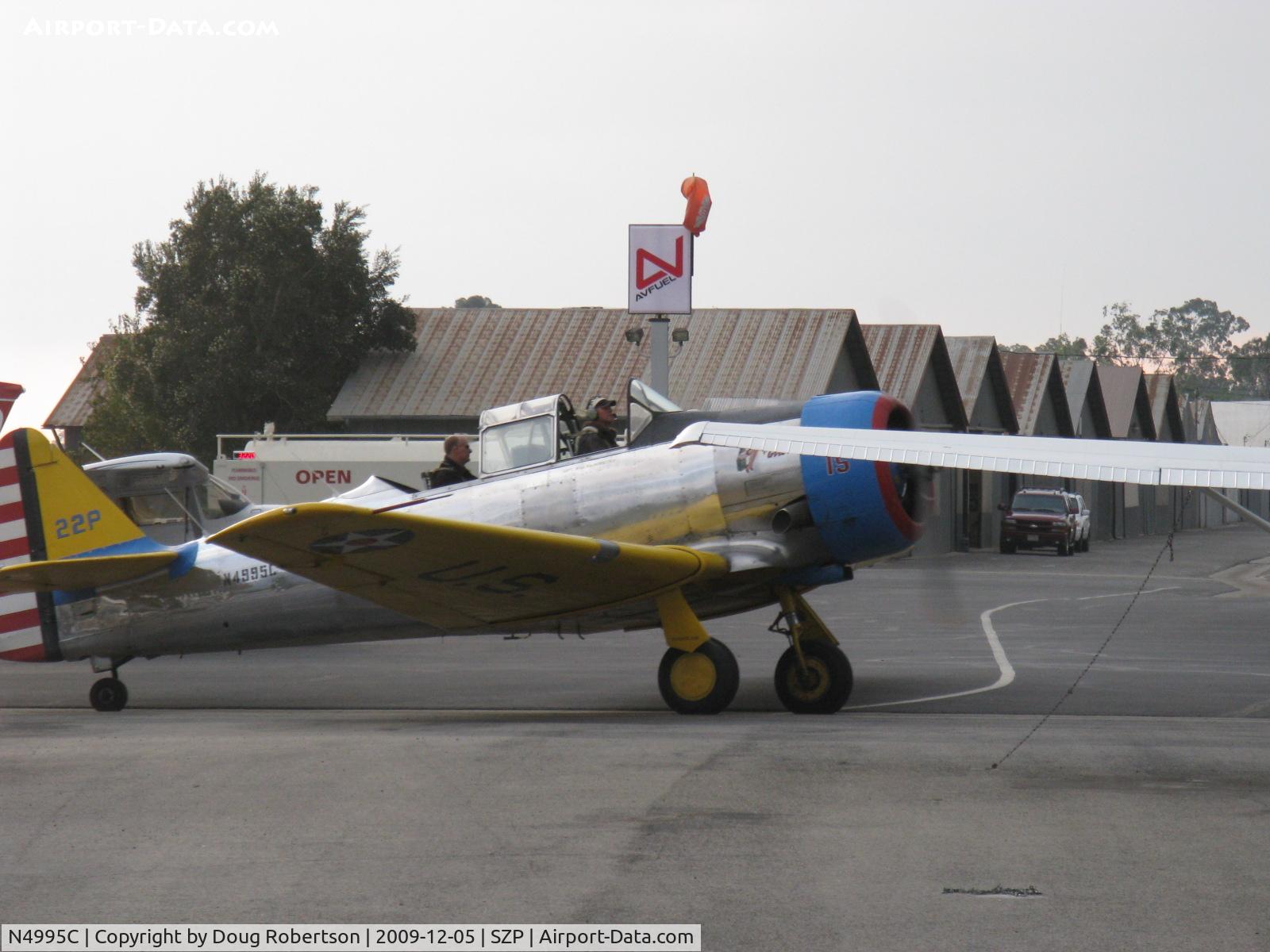 N4995C, 1949 North American T-6G Texan C/N 168-481, 1949 North American T-6G TEXAN 'Thirsty Girl', (1949 factory reman), P&W R-1340 WASP 600 Hp, taxi to hangar