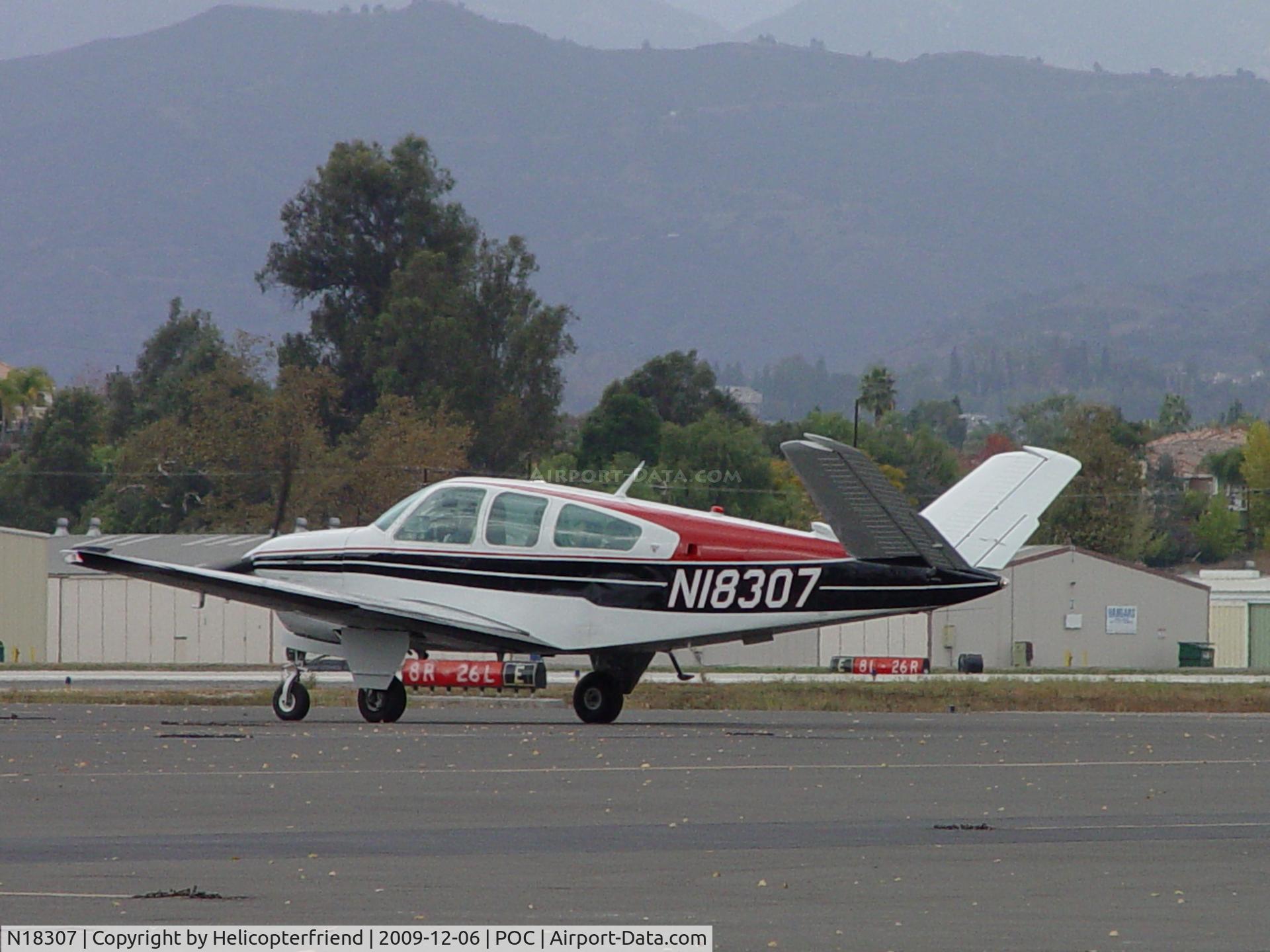 N18307, 1977 Beech V35B Bonanza C/N D-10038, Preparing to taxi to runway 26L for take off