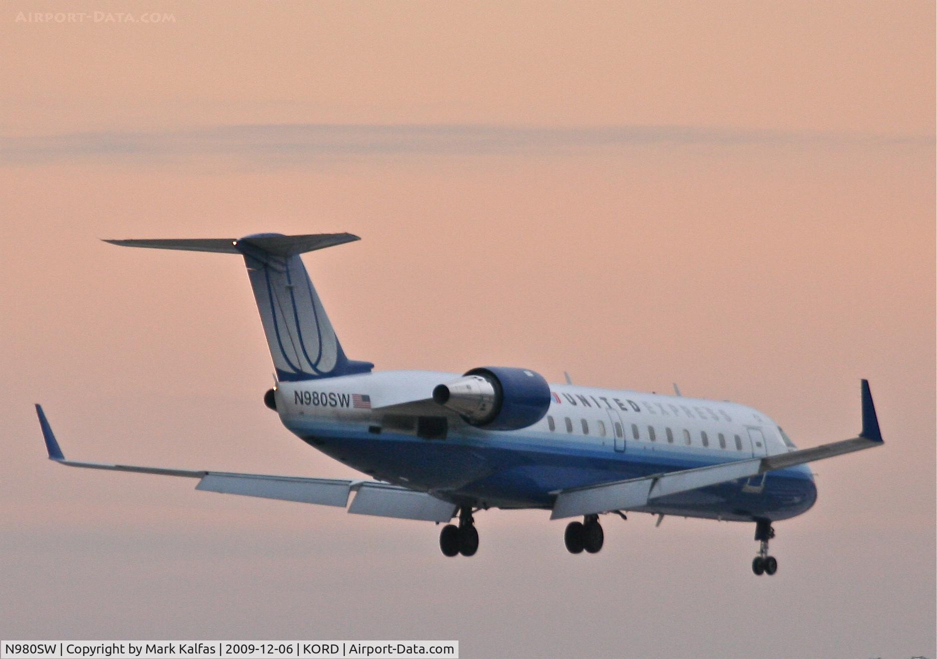 N980SW, 2004 Bombardier CRJ-200ER (CL-600-2B19) C/N 7955, SkyWest Airlines Bombardier CL-600-2B19, SKW6090 arriving from KMLI on 22R.