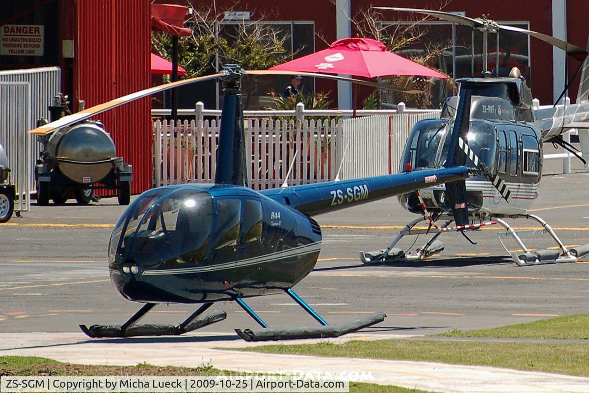 ZS-SGM, Robinson R44 Clipper II C/N 11634, Cape Town - Victoria & Alfred Waterfront Heliport (ZS-RWF in background)