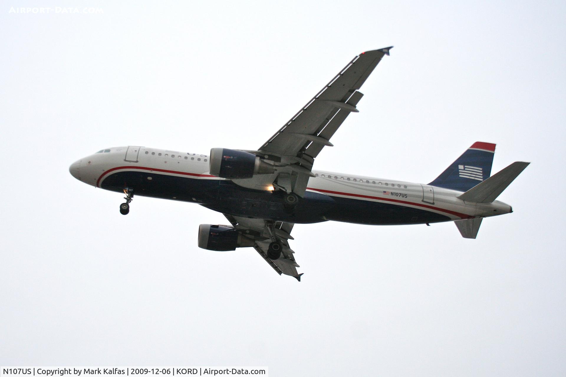 N107US, 1999 Airbus A320-214 C/N 1052, USAirways Airbus A320-214, AWE1996	 arriving from KPHL on 27L.