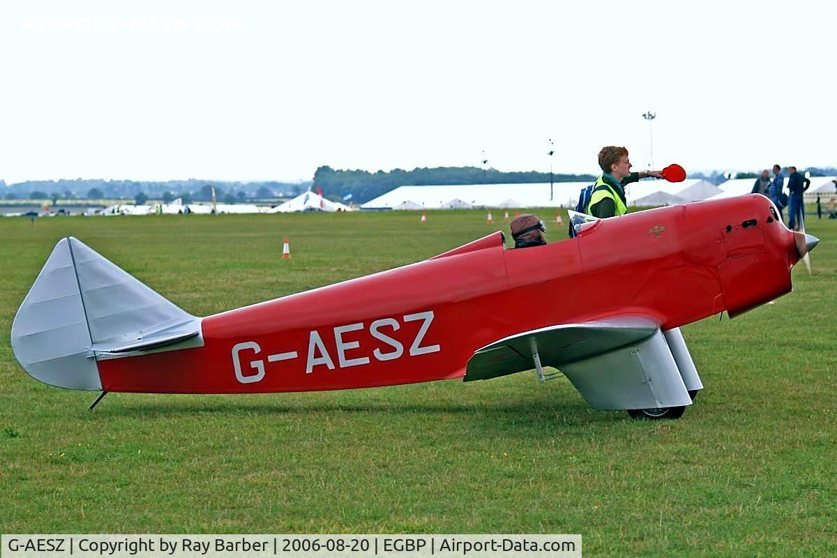 G-AESZ, 1937 Chilton DW1 C/N DW1/1, Chilton DW.1 [DW.1/1] Kemble~G 20/08/2006. Being helped to taxi in and park at PFA Flying for Fun Kemble 2006