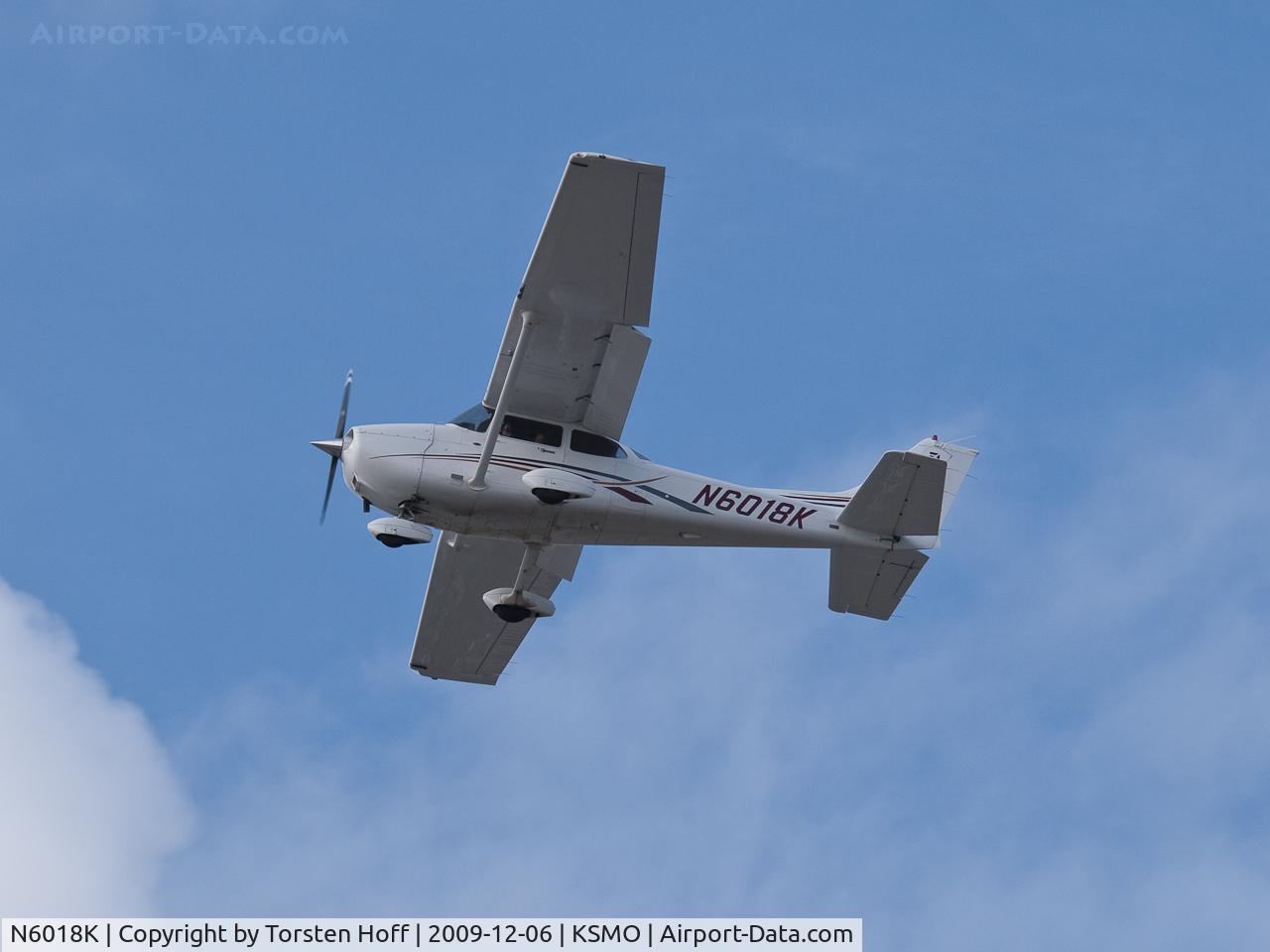 N6018K, 2006 Cessna 172S Skyhawk SP C/N 172S10174, N6018K over RWY 21