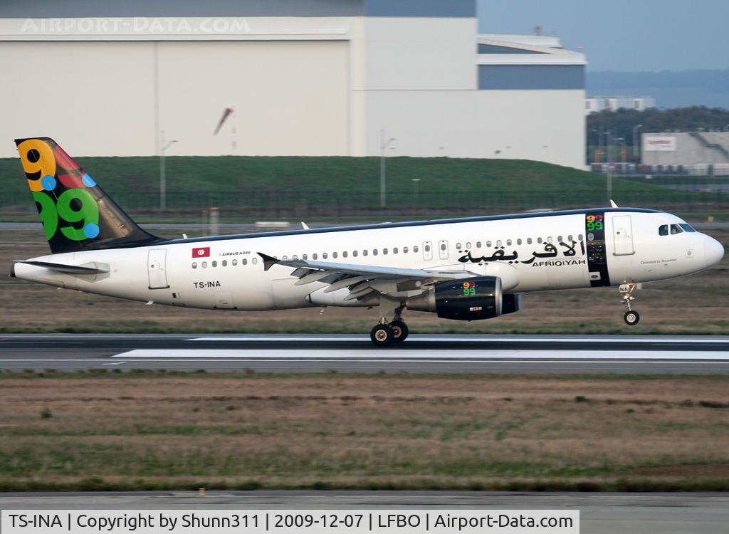 TS-INA, 1999 Airbus A320-214 C/N 1121, Landing rwy 14R... Arabic titles