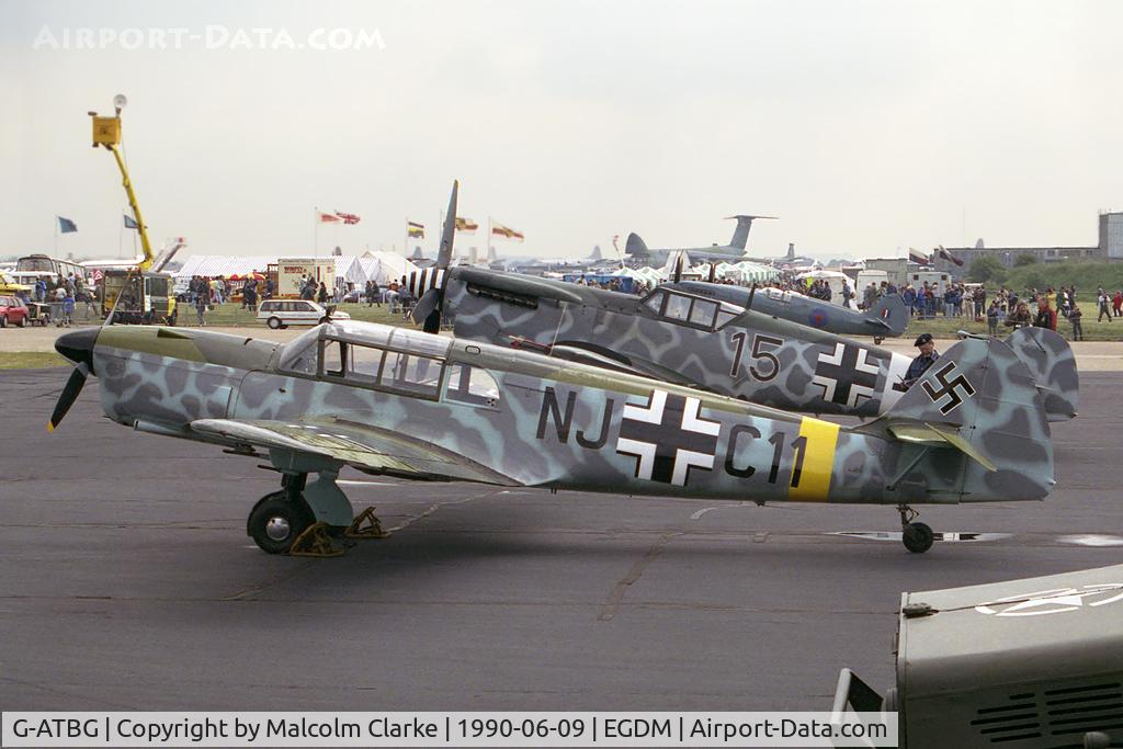 G-ATBG, 1945 Nord 1002 Pingouin II C/N 121, Nord 1002 Pingouin II. At the Battle of Britain Airshow, A&AEE, Boscombe Down in 1990. Behind is ME109 (Hispano HA1112) D-FEHD, now converted to an actual ME109 as D-FDME.