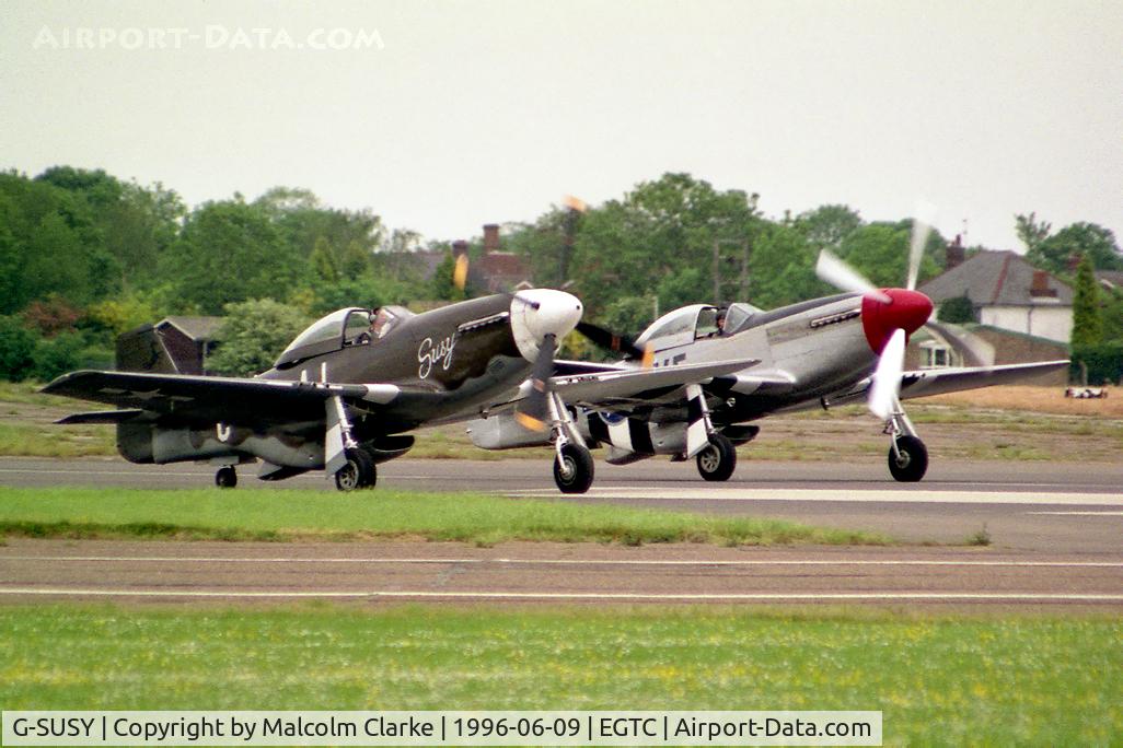 G-SUSY, 1944 North American P-51D Mustang C/N 122-39232, North American P-51D Mustang with Mustang N51RR at Cranfield's airshow celebrating the 50th Anniversary of the College of Aeronautics.