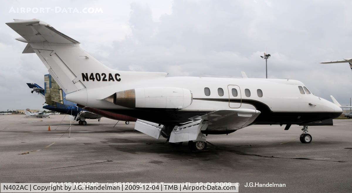 N402AC, 1963 Hawker Siddeley DH-125 C/N 25103, at Kendall-Tamiami on a rainy cloudy day