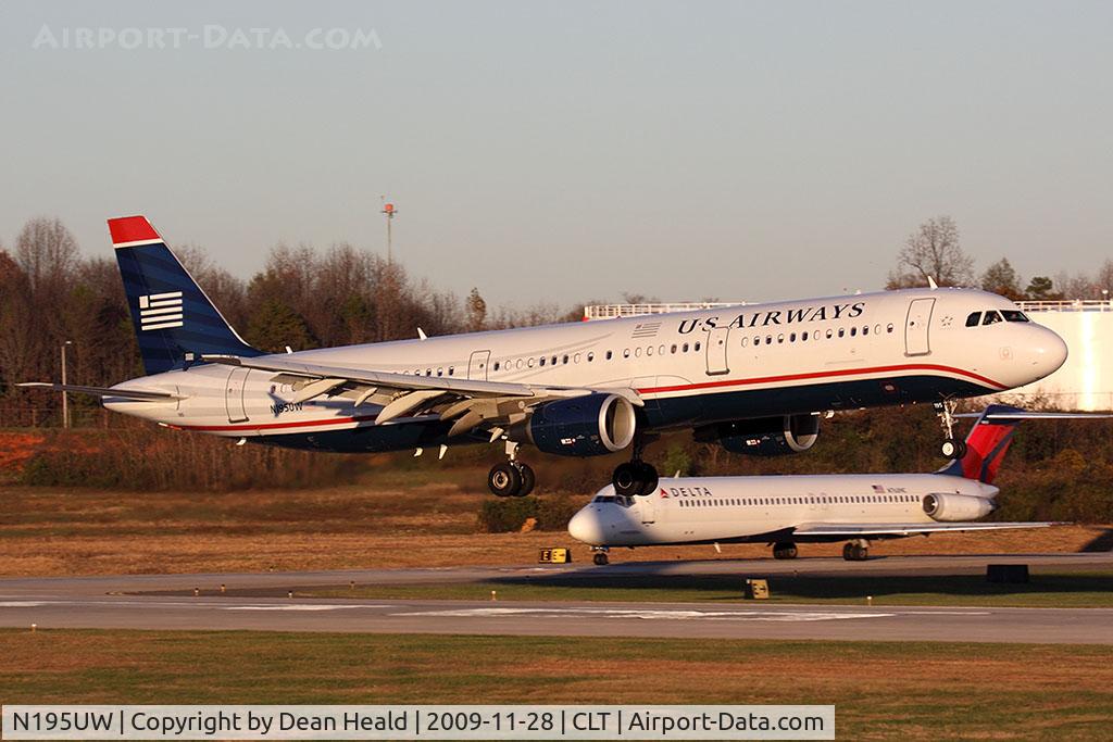 N195UW, 2008 Airbus A321-211 C/N 3633, US Airways N195UW (FLT AWE770) from San Francisco Int'l (KSFO) landing RWY 18C, with a Delta Air Lines DC-9 N768NC holding short.