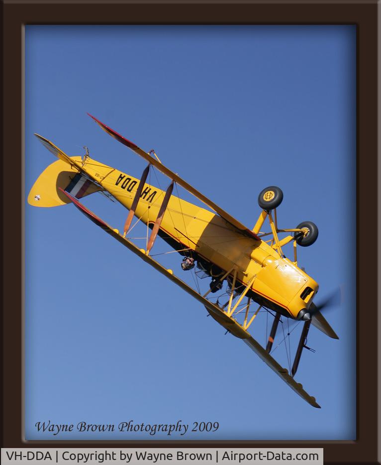 VH-DDA, 1940 De Havilland Australia DH-82A Tiger Moth C/N DHA169, VH-DDA (A17-168) looping above Luskintyre airfield.