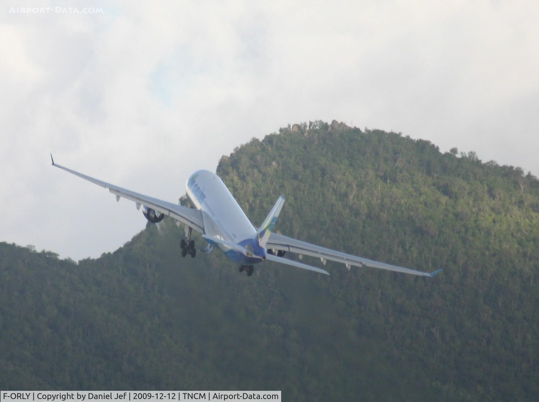 F-ORLY, 2006 Airbus A330-323X C/N 758, Air caraibes clearing the hills on the way out of St Maarten