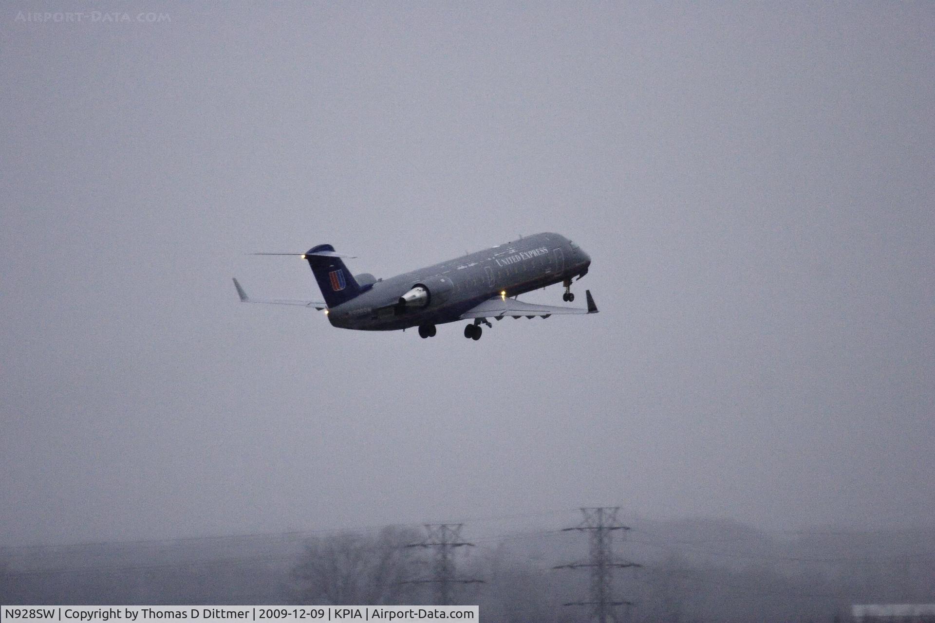 N928SW, 2002 Bombardier CRJ-200LR (CL-600-2B19) C/N 7701, United Express (N928SW) departs Peoria Illinois for its' destination
