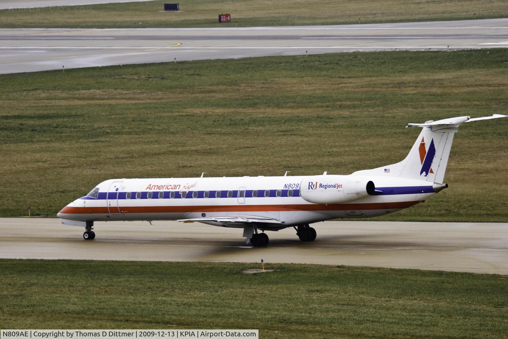N809AE, 2001 Embraer ERJ-140LR (EMB-135KL) C/N 145521, American Eagle (N809AE) near the runway at Peoria Illinois