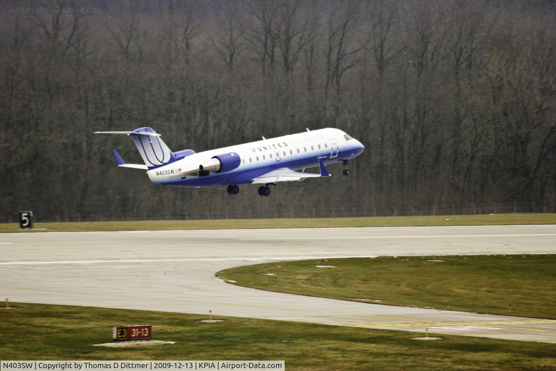 N403SW, 1993 Canadair CRJ-100LR (CL-600-2B19) C/N 7028, United Express (N403SW) airborne