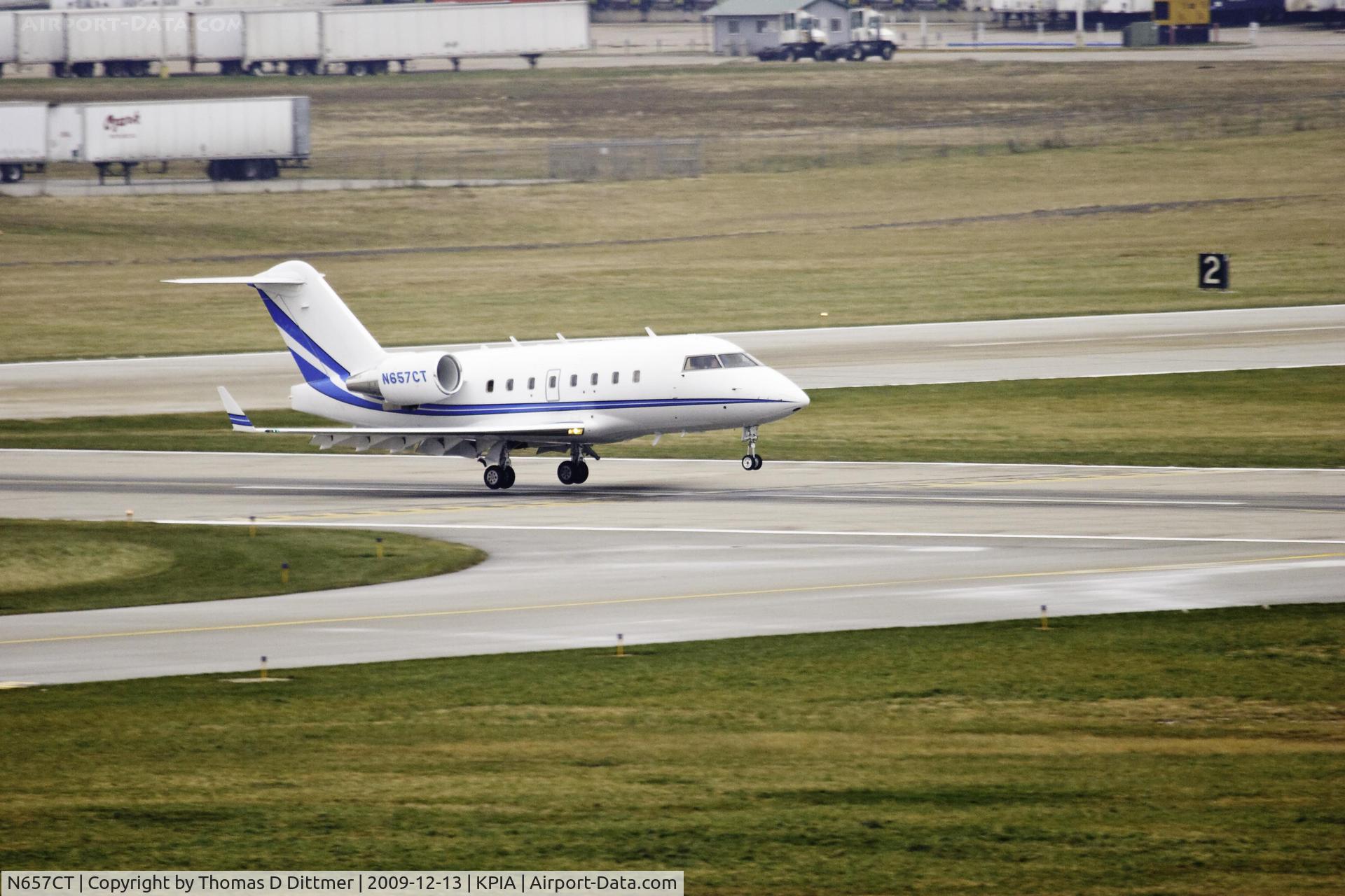 N657CT, 2006 Bombardier Challenger 604 (CL-600-2B16) C/N 5665, N657CT touches down