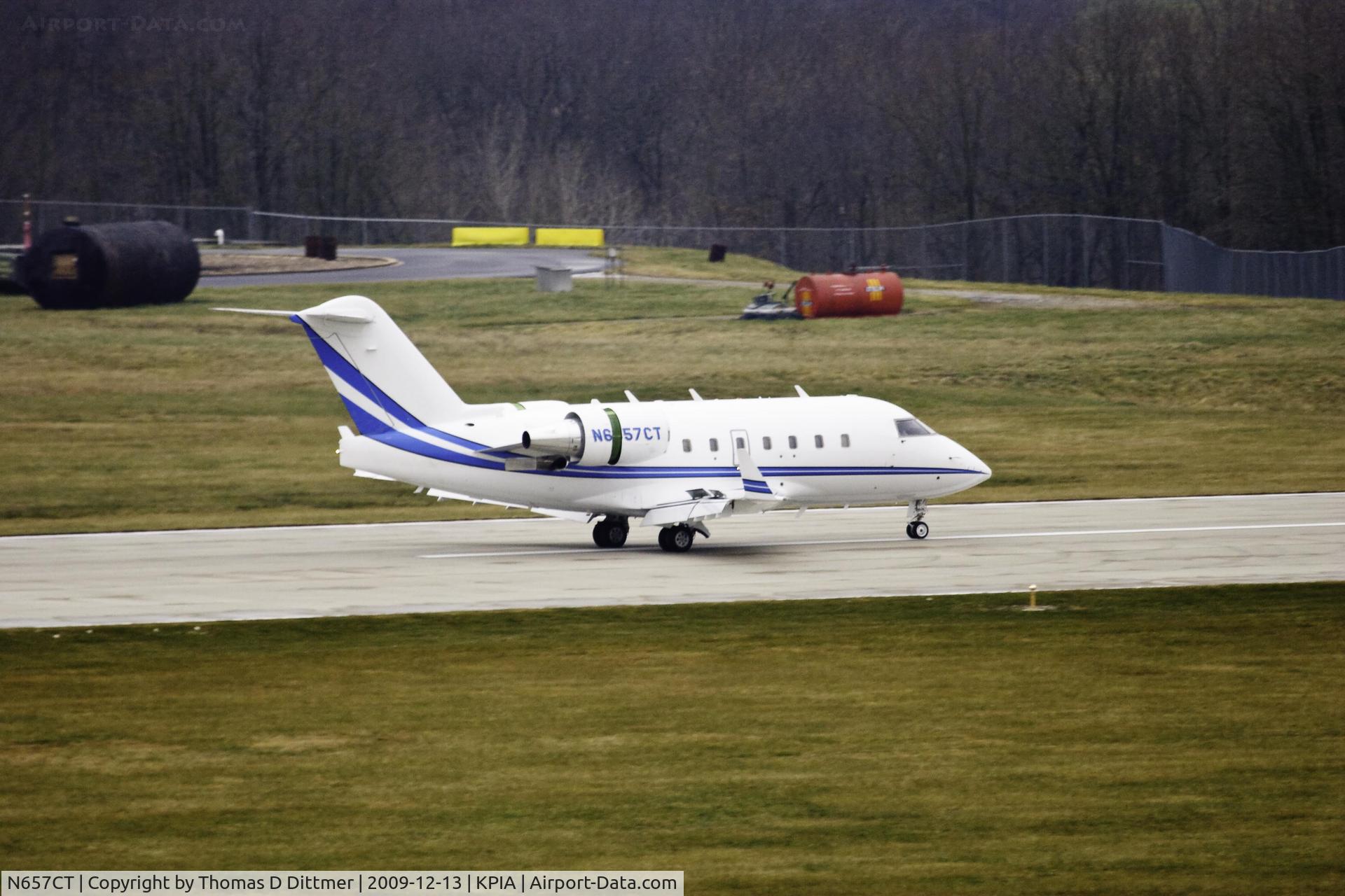 N657CT, 2006 Bombardier Challenger 604 (CL-600-2B16) C/N 5665, N657CT slows with thrust reversers deployed