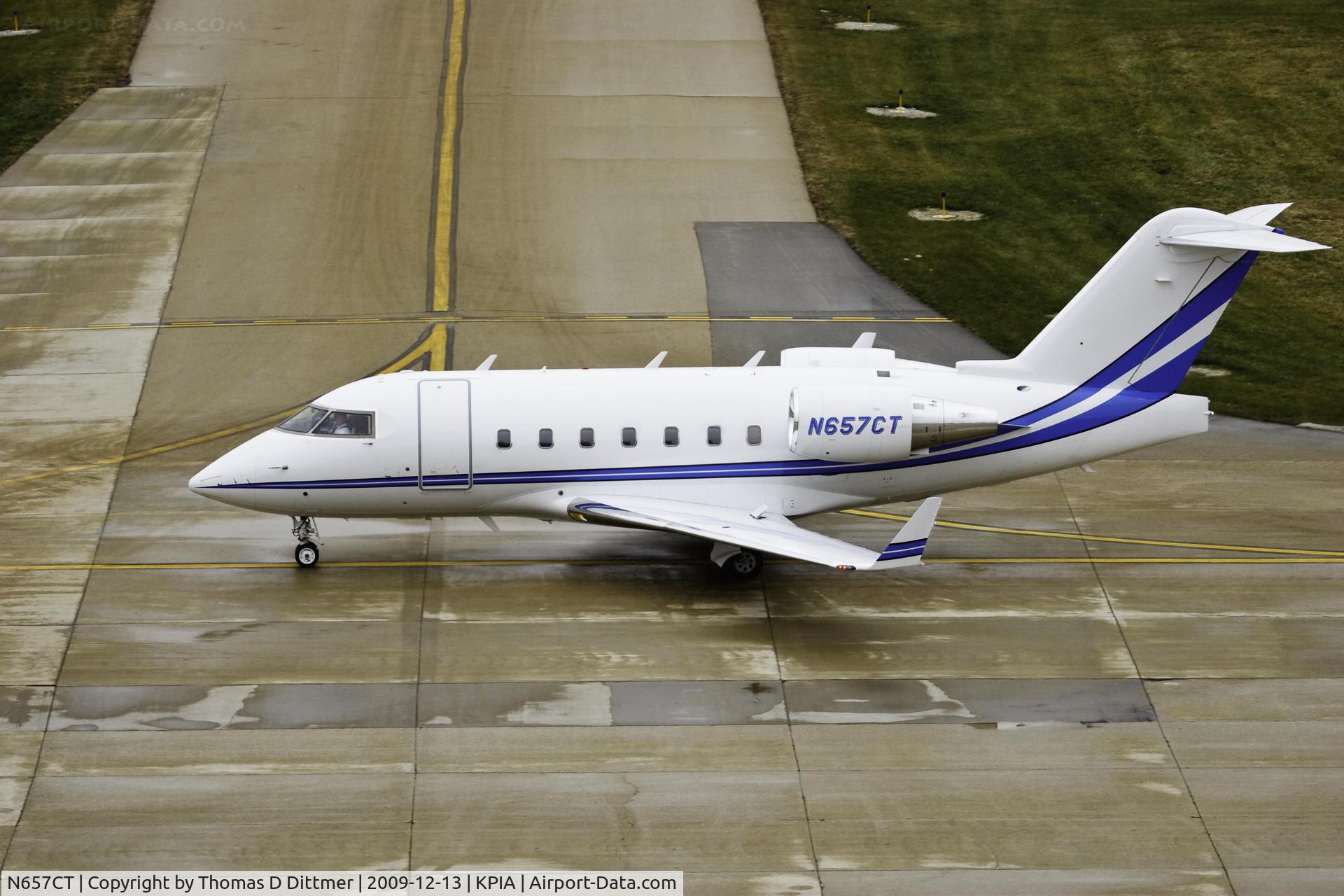 N657CT, 2006 Bombardier Challenger 604 (CL-600-2B16) C/N 5665, N657CT taxies to the hangar