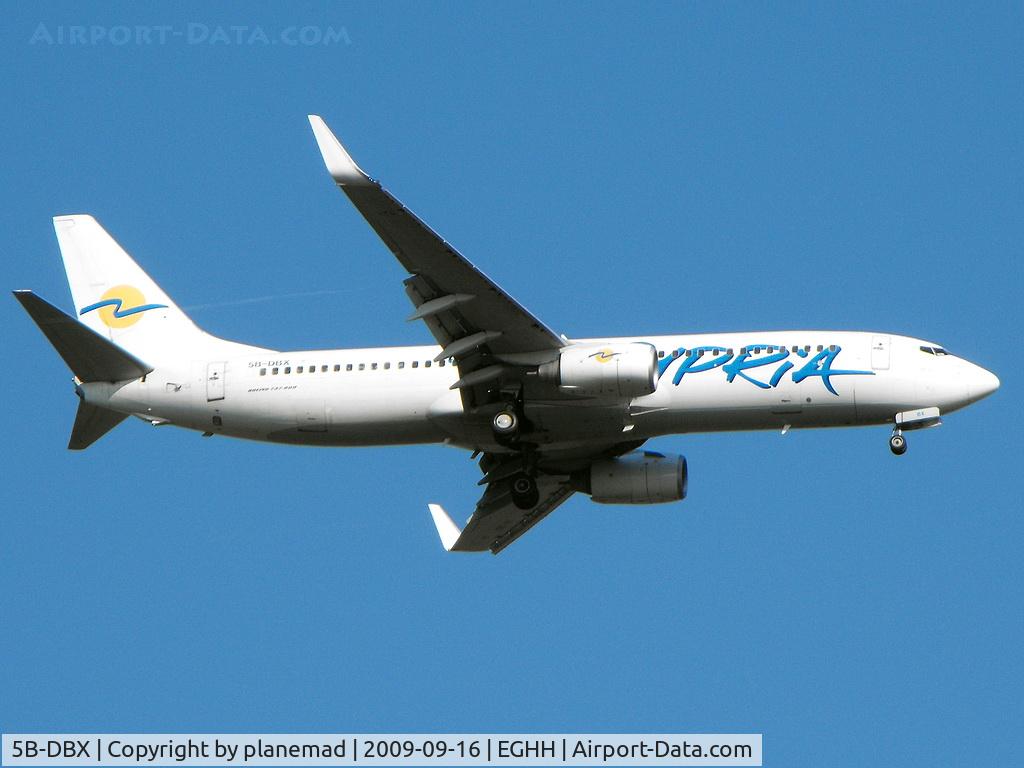 5B-DBX, 2003 Boeing 737-8Q8 C/N 33699, 08 landing, taken from home
