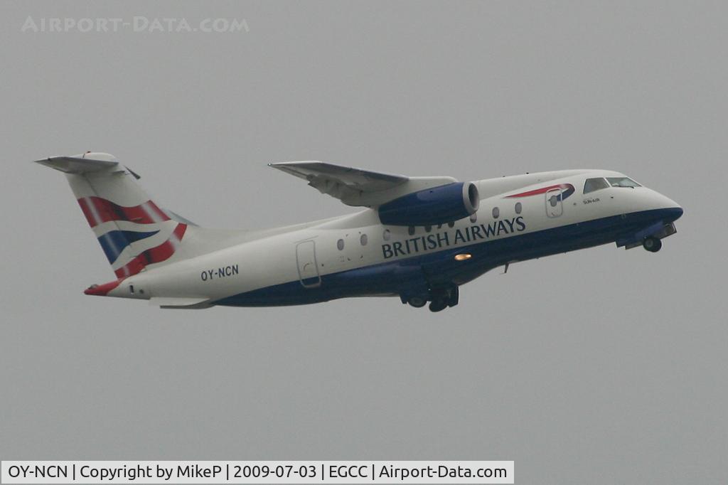 OY-NCN, 2001 Fairchild Dornier 328-310 328JET C/N 3193, Climbing away from Runway 05L on a grey Manchester morning.