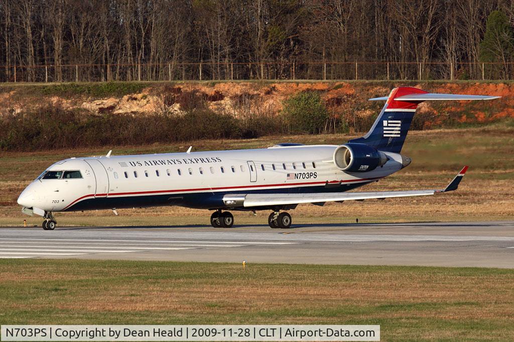 N703PS, 2004 Bombardier CRJ-701 (CL-600-2C10) Regional Jet C/N 10137, US Airways Express (PSA Airlines) N703PS taxiing onto RWY 18C for takeoff.