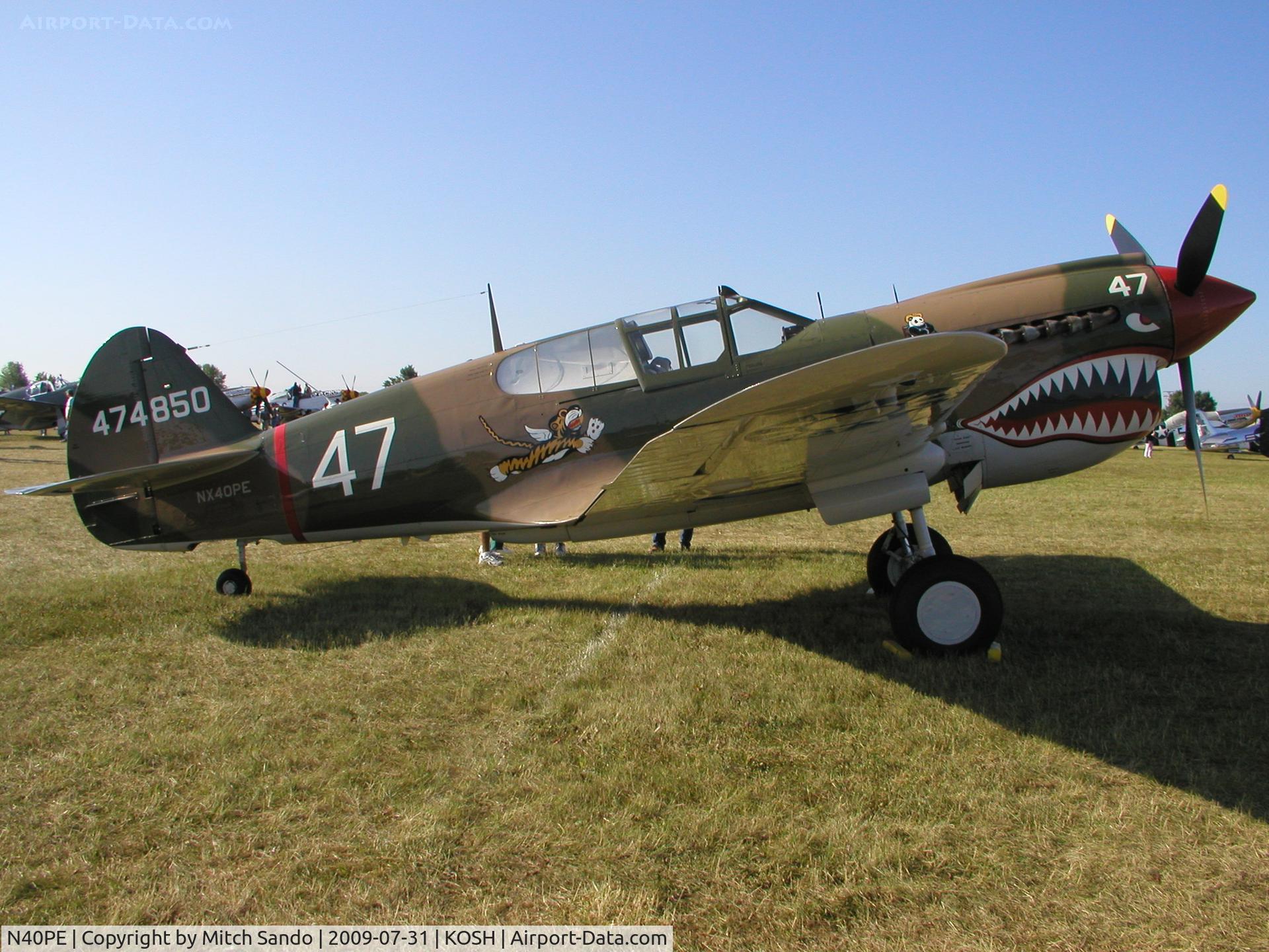 N40PE, 1942 Curtiss P-40E C/N AK905, EAA AirVenture 2009.