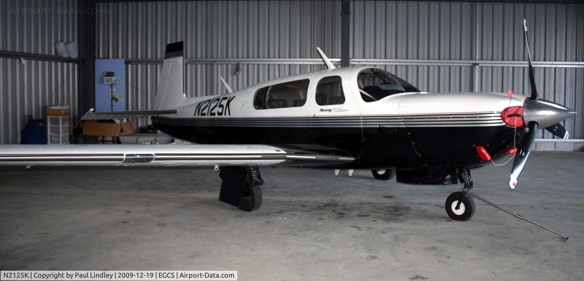 N2125K, 1997 Mooney M20M Bravo C/N 27-0239, Under cover for Winter.