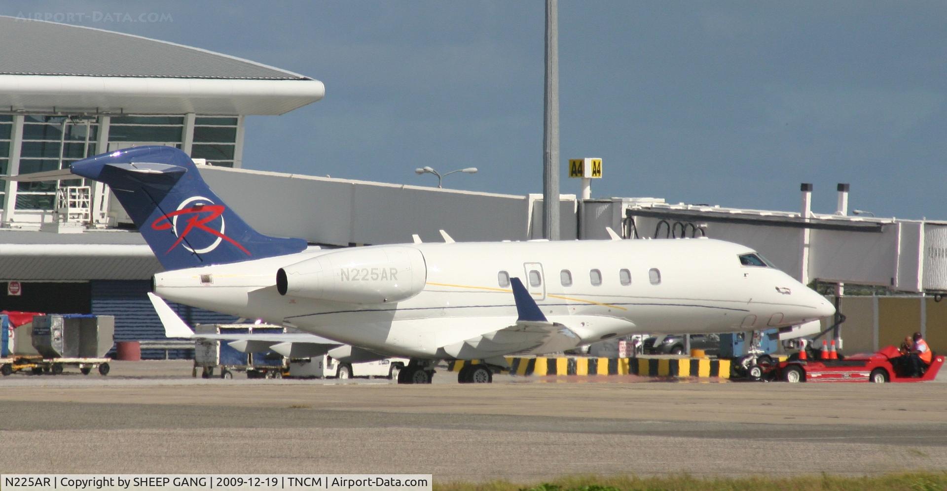 N225AR, 2007 Bombardier Challenger 300 (BD-100-1A10) C/N 20166, N220AR being taken from the Charlie ramp to a next park!!!
