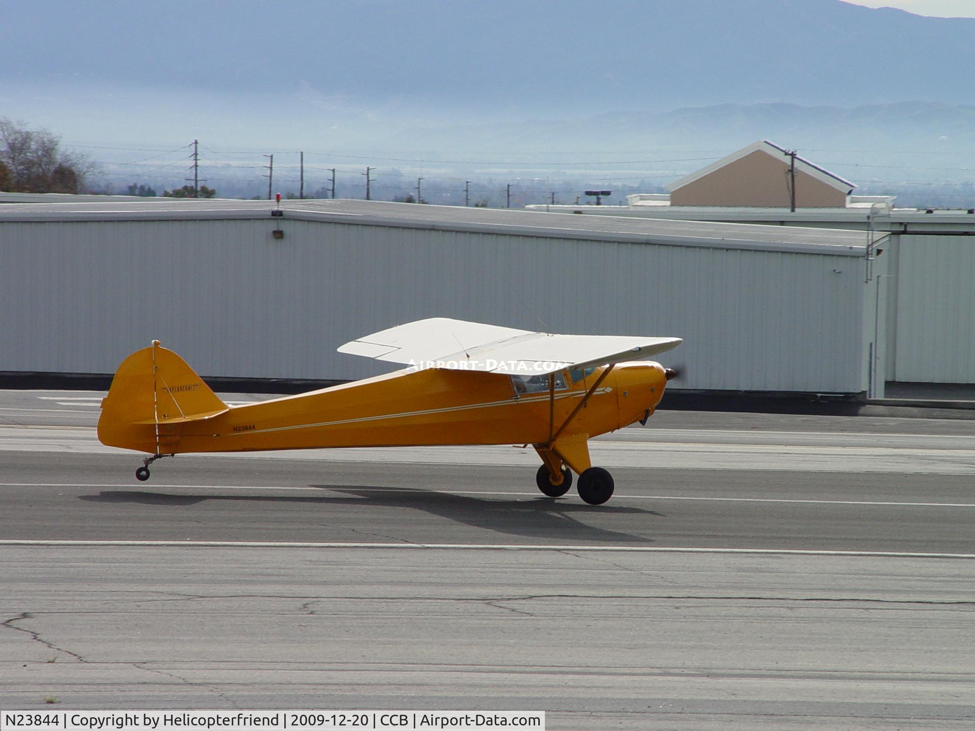 N23844, 1939 Taylorcraft BL-65 (L-2F) C/N 1480, Lifting off from runway 24 westbound
