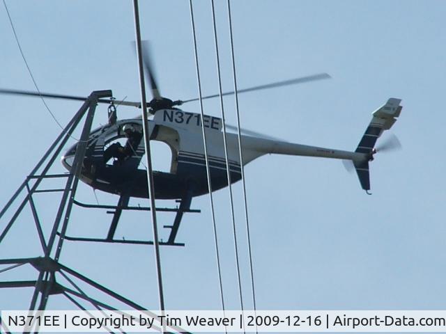 N371EE, 1989 McDonnell Douglas 369E C/N 0371E, Pulling High Voltage Cable In Spring Hill TN