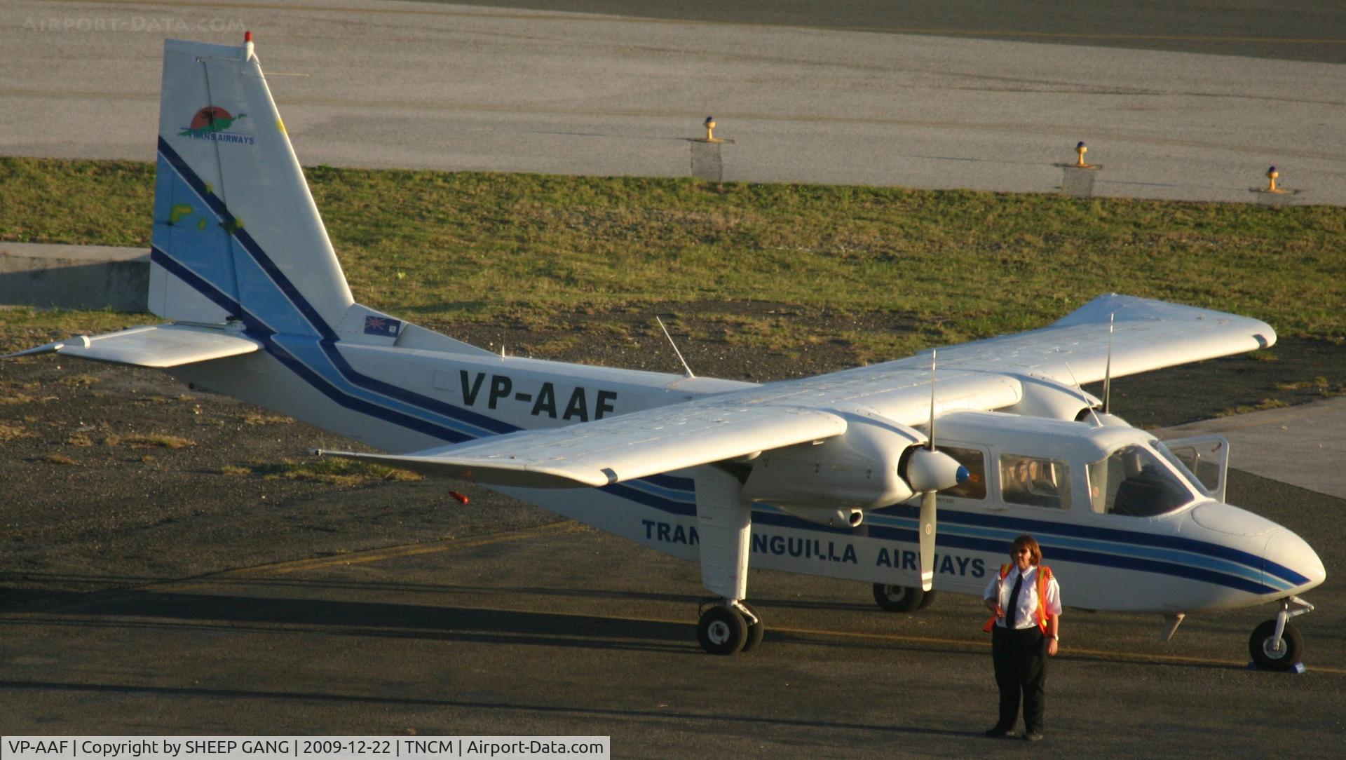 VP-AAF, 1980 Pilatus Britten-Norman BN-2B-21 Islander C/N 2024B, VP-AAF with it's pilot standing right next to the aircraft