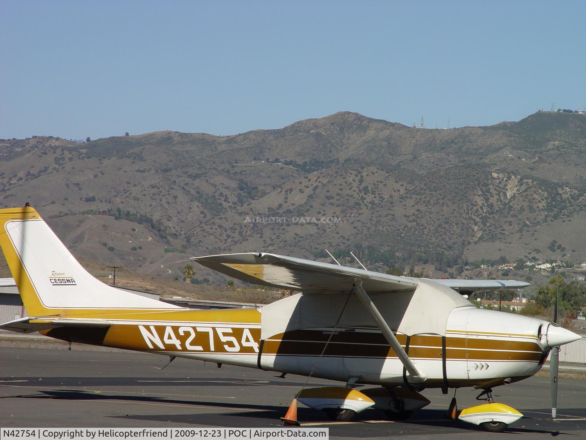 N42754, 1968 Cessna 182L Skylane C/N 182-59175, Parked covered up on the westside of NAI Aircraft Services