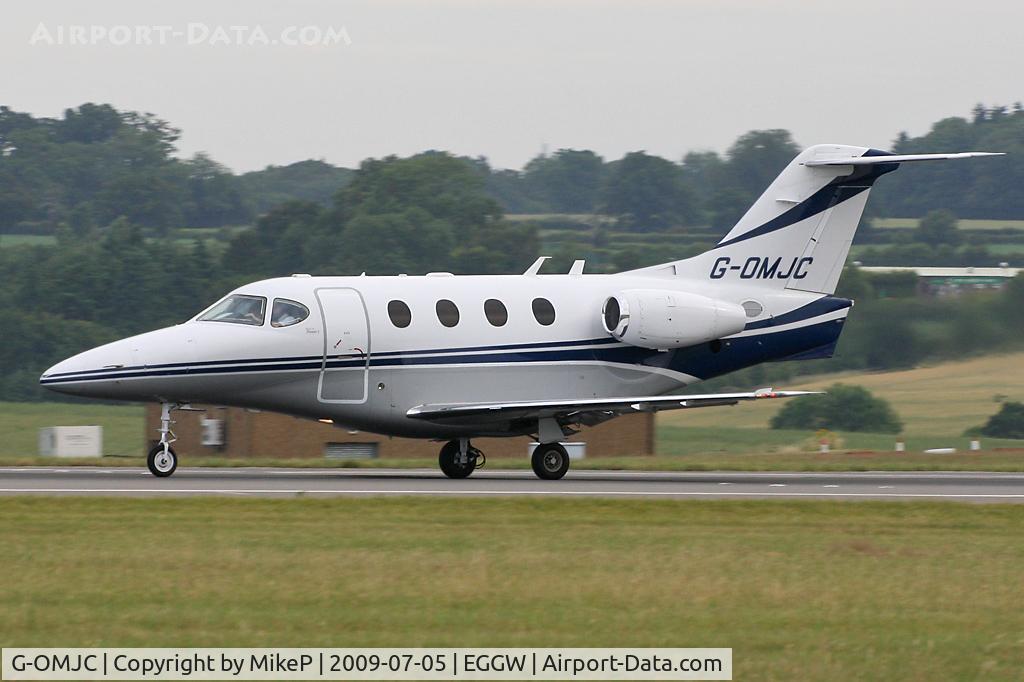 G-OMJC, 2003 Raytheon 390 Premier I C/N RB-88, Rolling down Runway 26 at Luton.