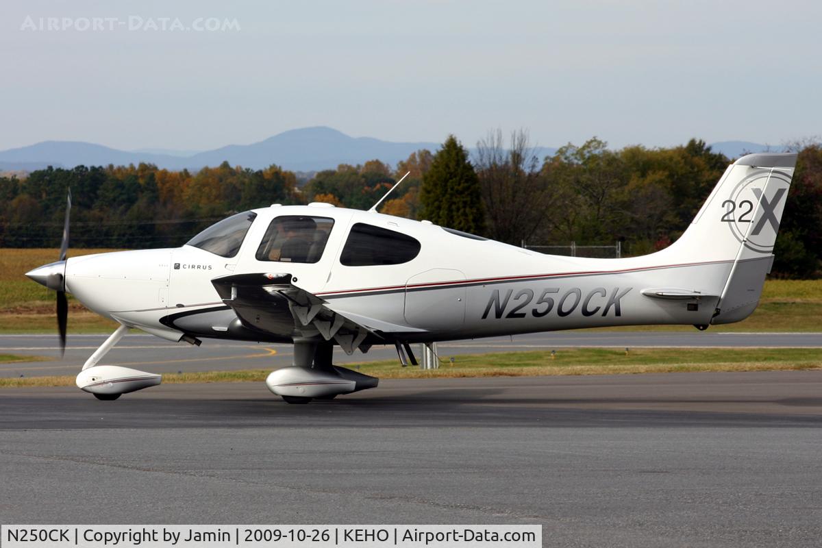 N250CK, 2009 Cirrus SR22X C/N 3421, Departing the pumps after a short visit.